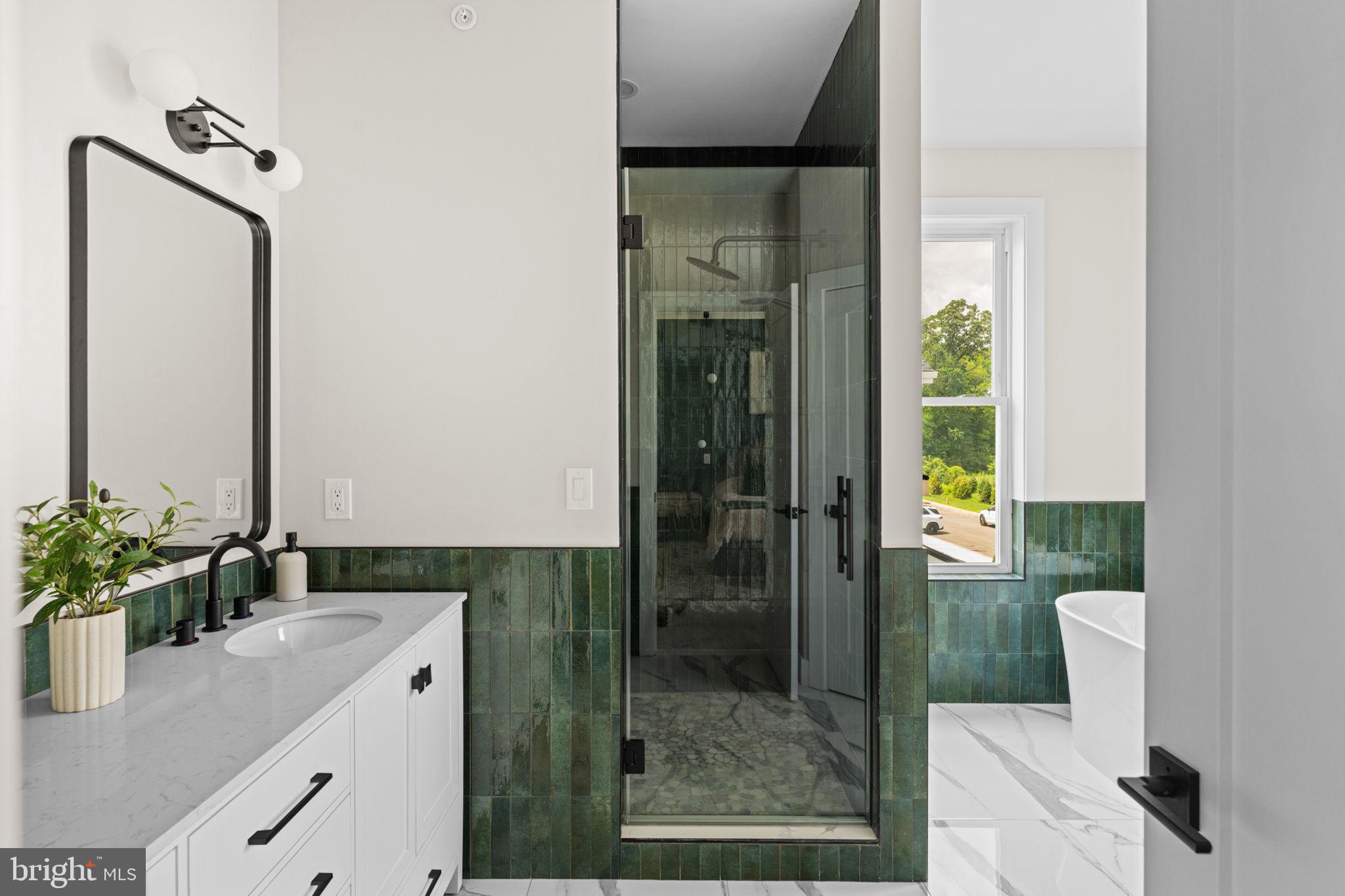 649 Provident Road Southampton, PA 18966 - Photo 21 of 36 a bathroom with a sink a toilet and shower