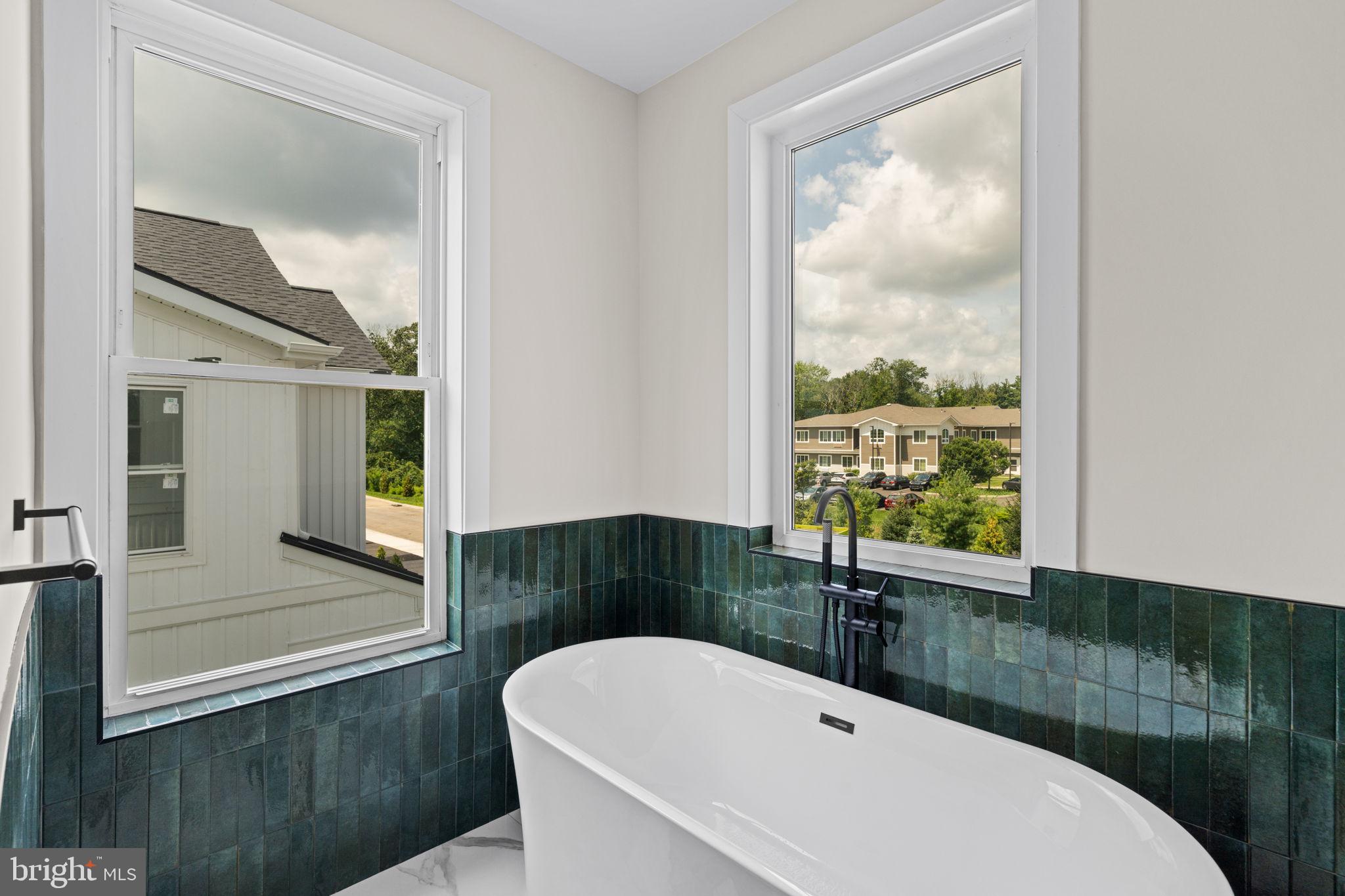 649 Provident Road Southampton, PA 18966 - Photo 23 of 36 a bathroom with a sink and a bathtub