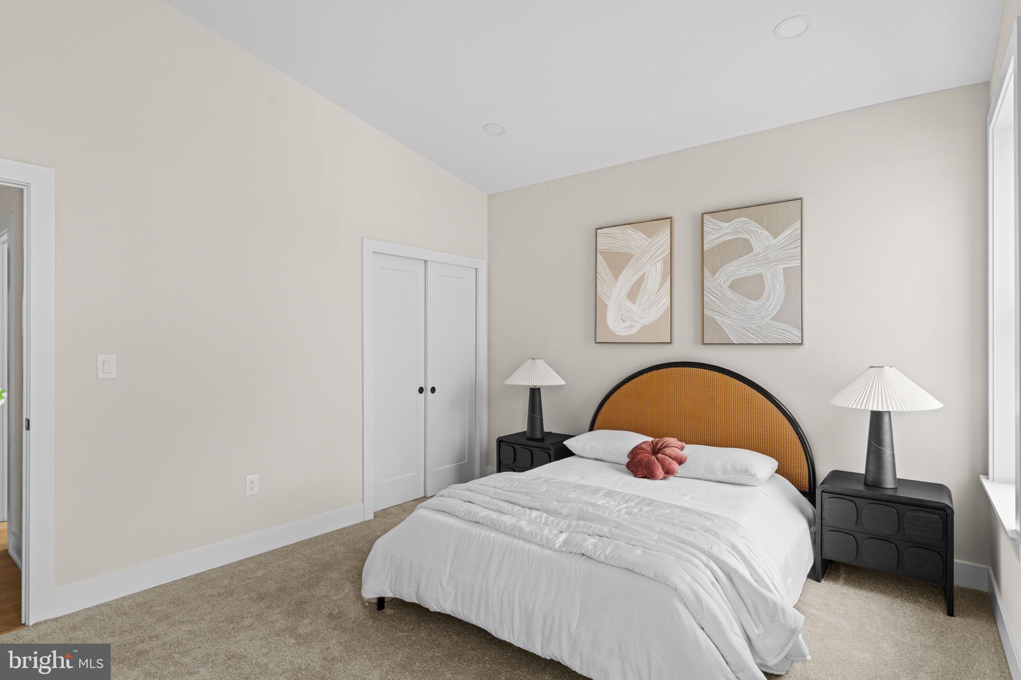 649 Provident Road Southampton, PA 18966 - Photo 26 of 36 a bedroom with a bed and a potted plant