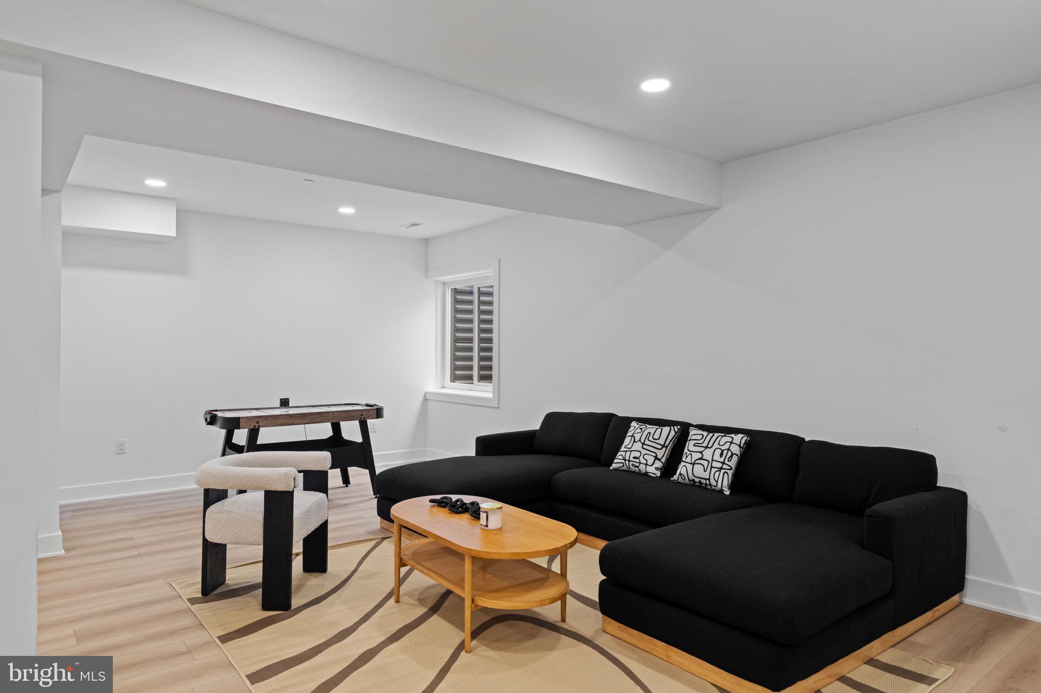 649 Provident Road Southampton, PA 18966 - Photo 32 of 36 a living room with furniture and a wooden floor