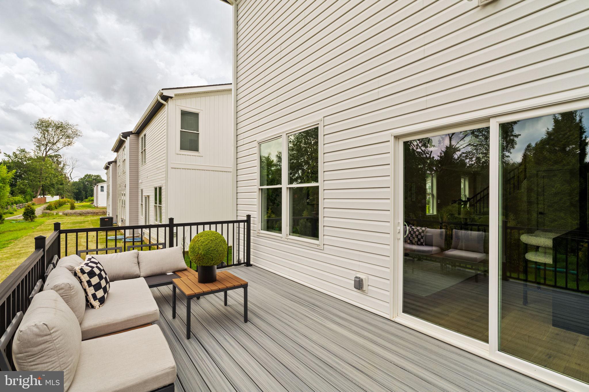 649 Provident Road Southampton, PA 18966 - Photo 34 of 36 a balcony with furniture and wooden floor