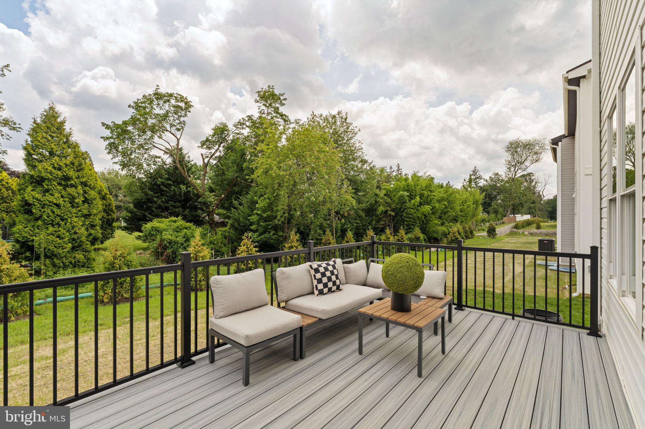 649 Provident Road Southampton, PA 18966 - Photo 35 of 36 a balcony with wooden floor table and chairs