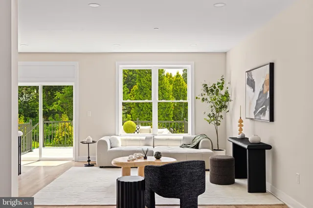 a view of a livingroom with furniture and window