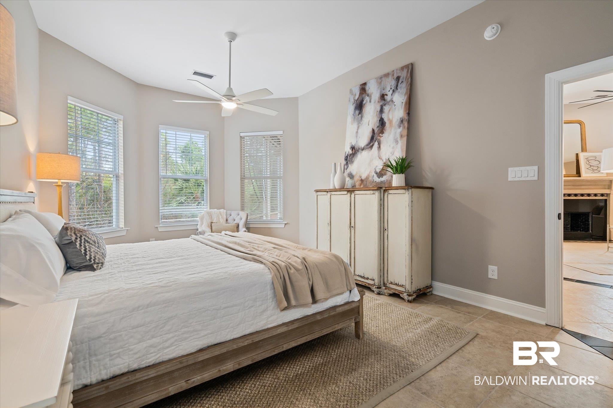 9259 Genipa Way Gulf Shores, AL 36542 - Photo 27 of 72 Bedroom featuring ceiling fan and light tile patterned floors