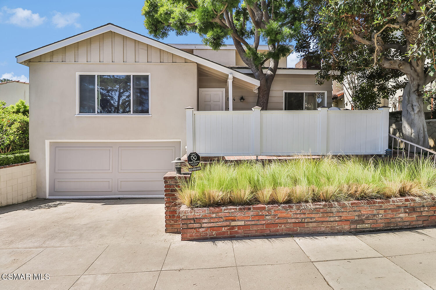 a view of a backyard of the house
