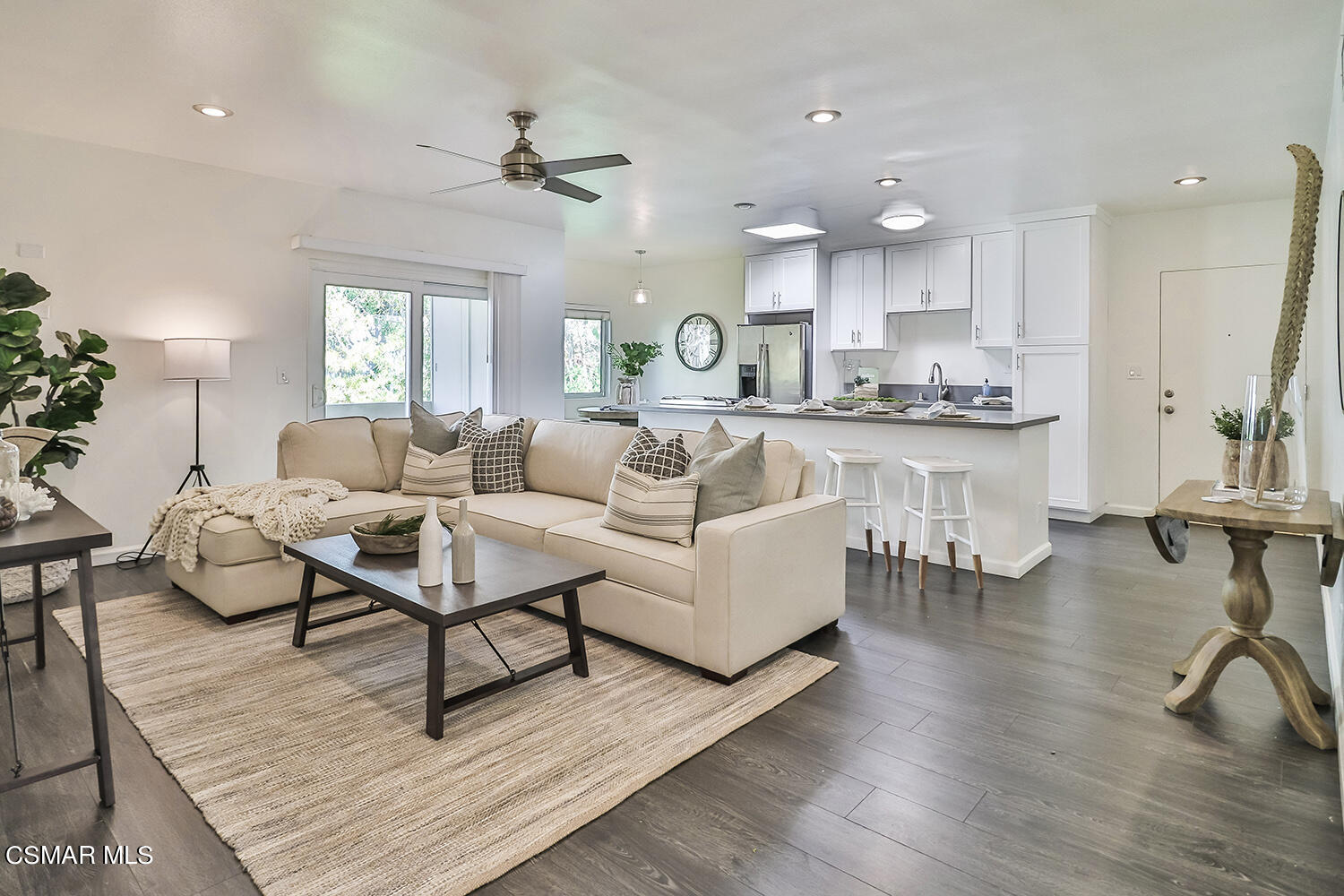 844 16th Street, Unit 5 Santa Monica, CA 90403 - Photo 12 of 31 a living room with furniture and a wooden floor