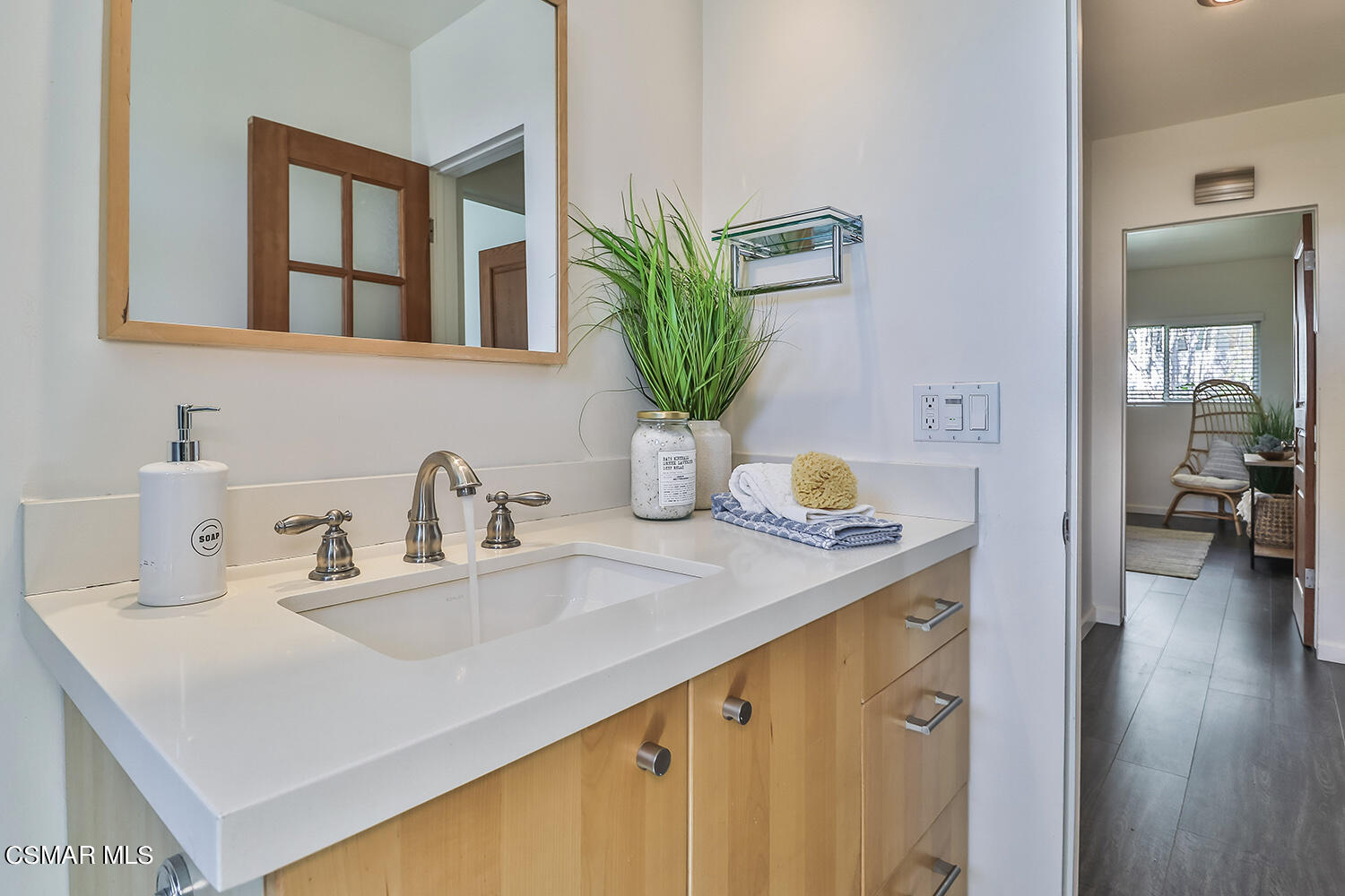 844 16th Street, Unit 5 Santa Monica, CA 90403 - Photo 19 of 31 a bathroom with a sink a vanity and a mirror