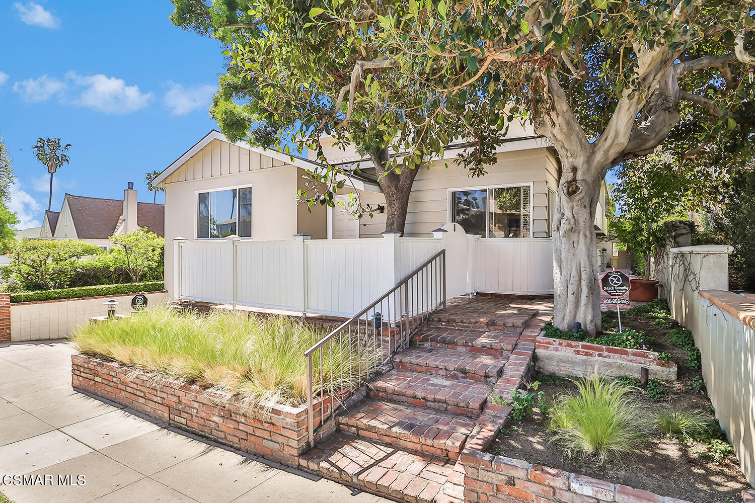 844 16th Street, Unit 5 Santa Monica, CA 90403 - Photo 2 of 31 a front view of a house with swimming pool