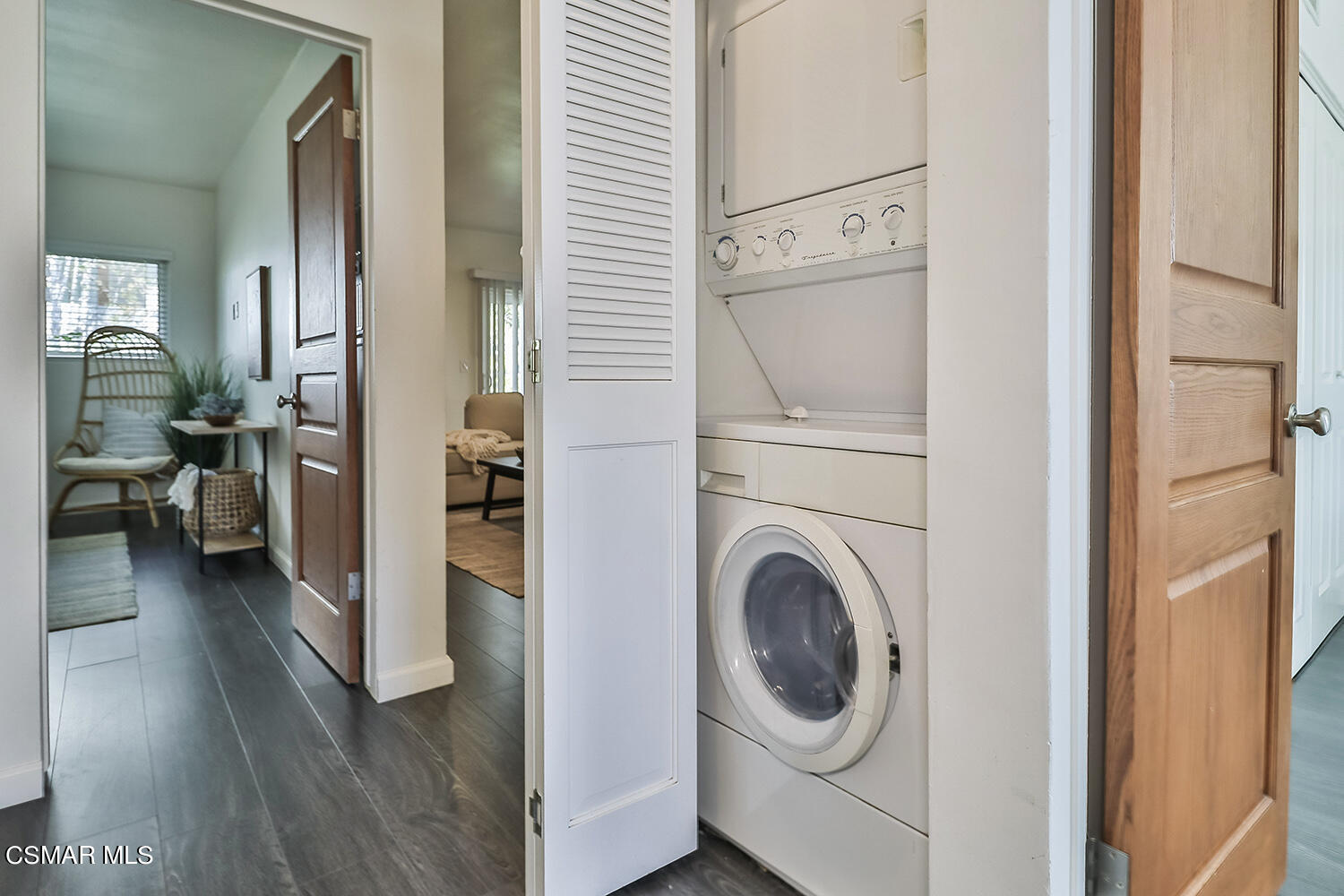 844 16th Street, Unit 5 Santa Monica, CA 90403 - Photo 27 of 31 a view of a hallway with washer and dryer