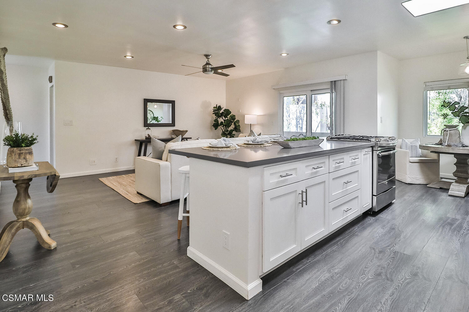 844 16th Street, Unit 5 Santa Monica, CA 90403 - Photo 5 of 31 a kitchen with a sink stove and wooden floor