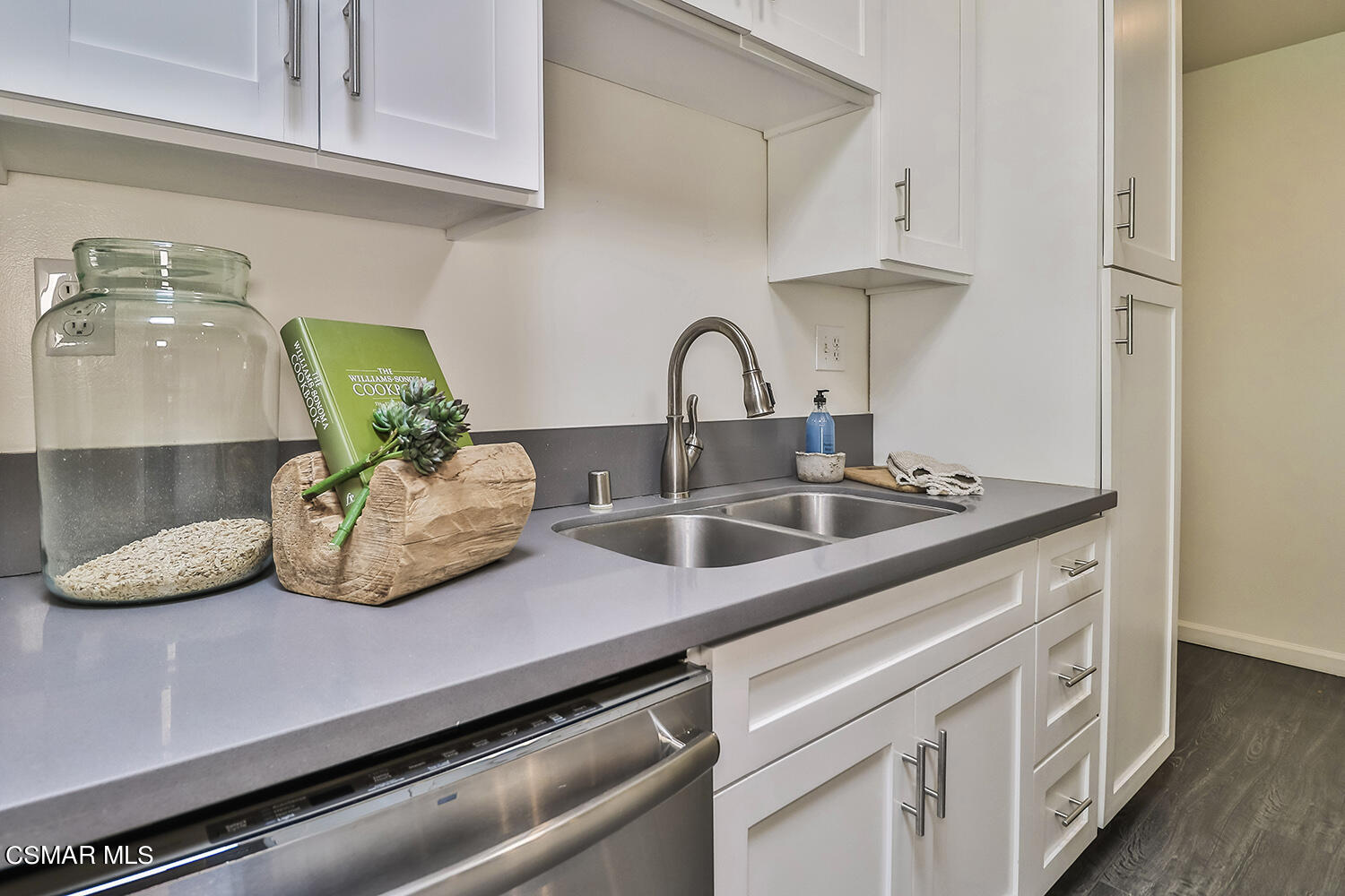 844 16th Street, Unit 5 Santa Monica, CA 90403 - Photo 9 of 31 a kitchen with a sink and cabinets