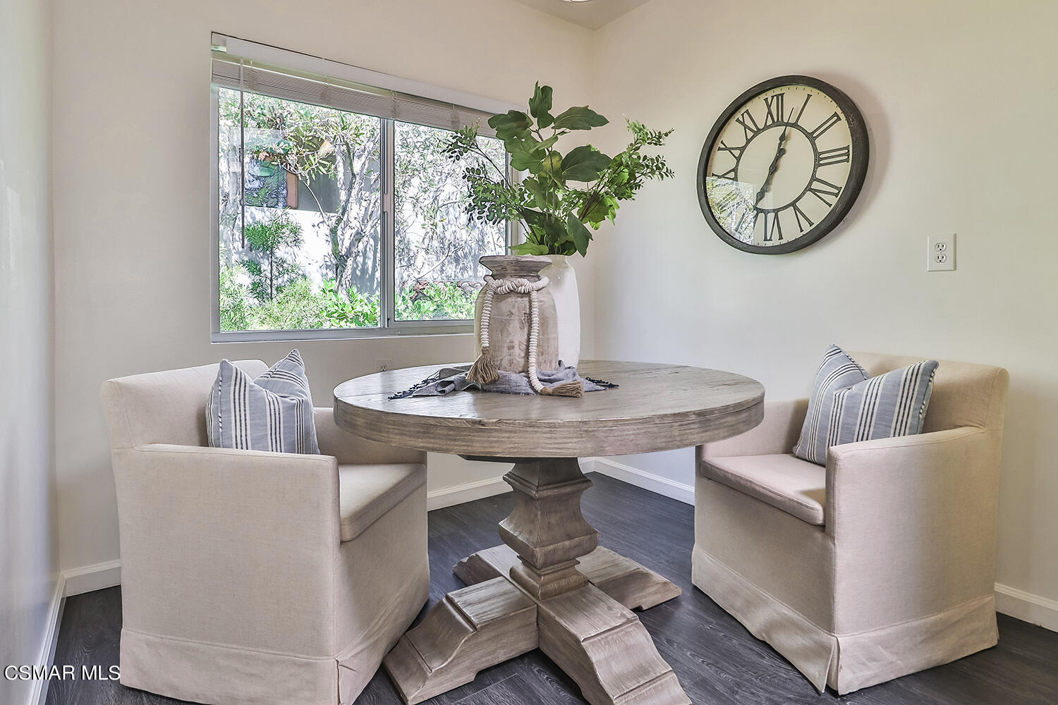 844 16th Street, Unit 5 Santa Monica, CA 90403 - Photo 10 of 31 a view of a dining room with furniture window and wooden floor