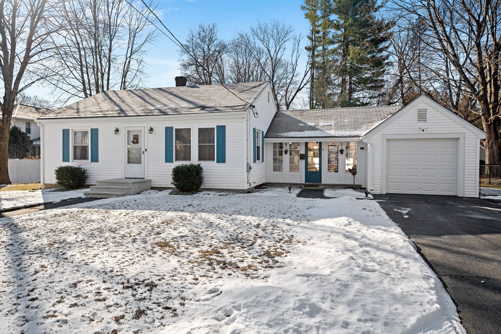 8 Taft Street Uxbridge, MA 01569 - Photo 25 of 31 a front view of a house with a yard