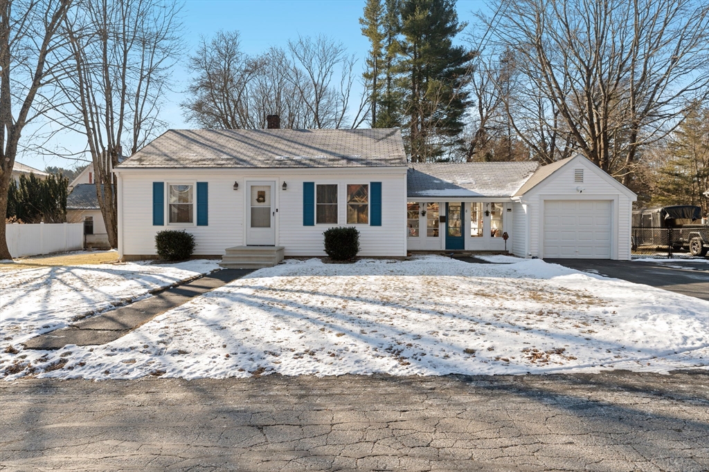 8 Taft Street Uxbridge, MA 01569 - Photo 3 of 31 a view of a house with a yard covered in snow