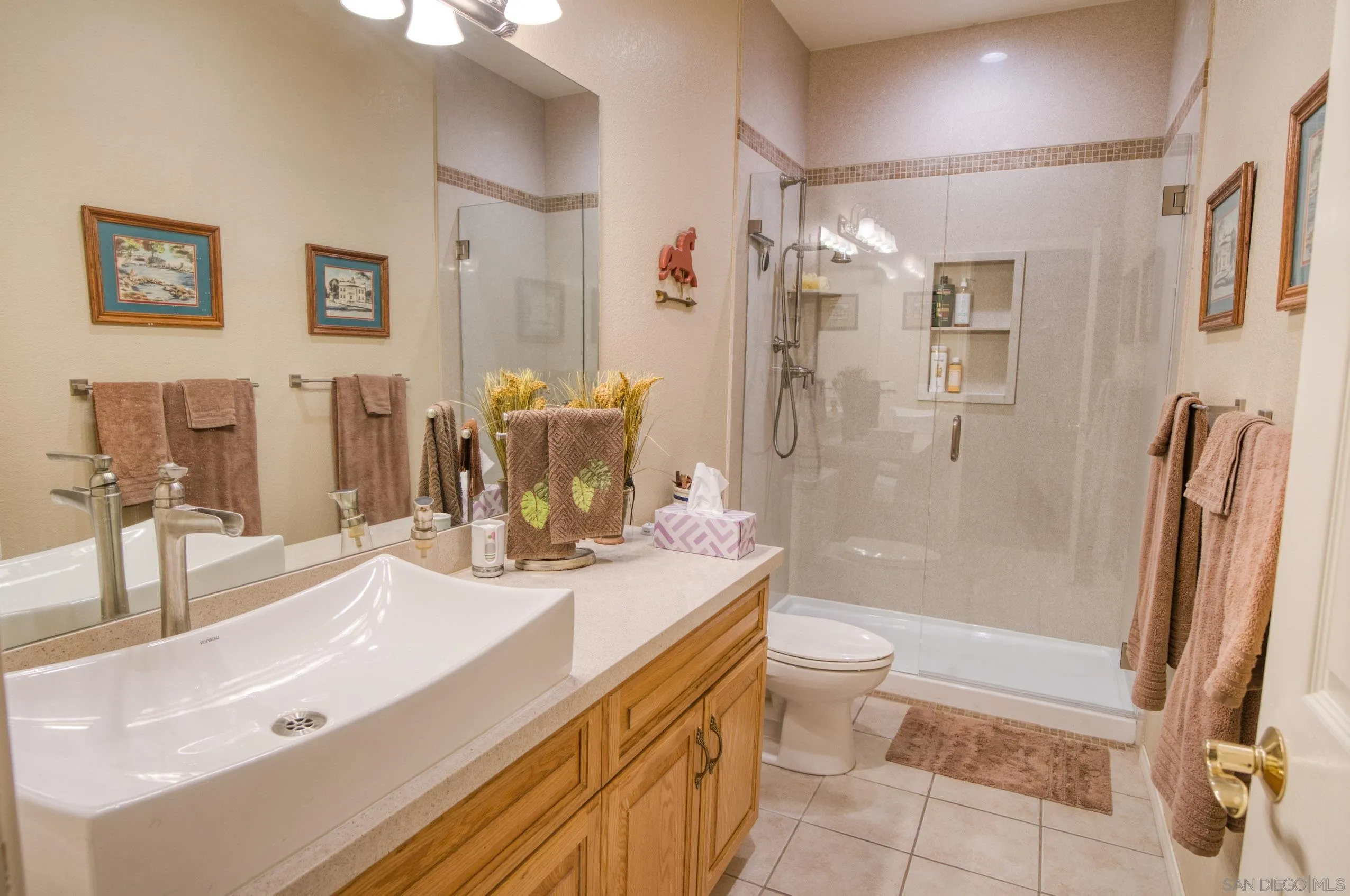 24517 Rutherford Road Ramona, CA 92065 - Photo 19 of 50 a bathroom with a sink a toilet and shower