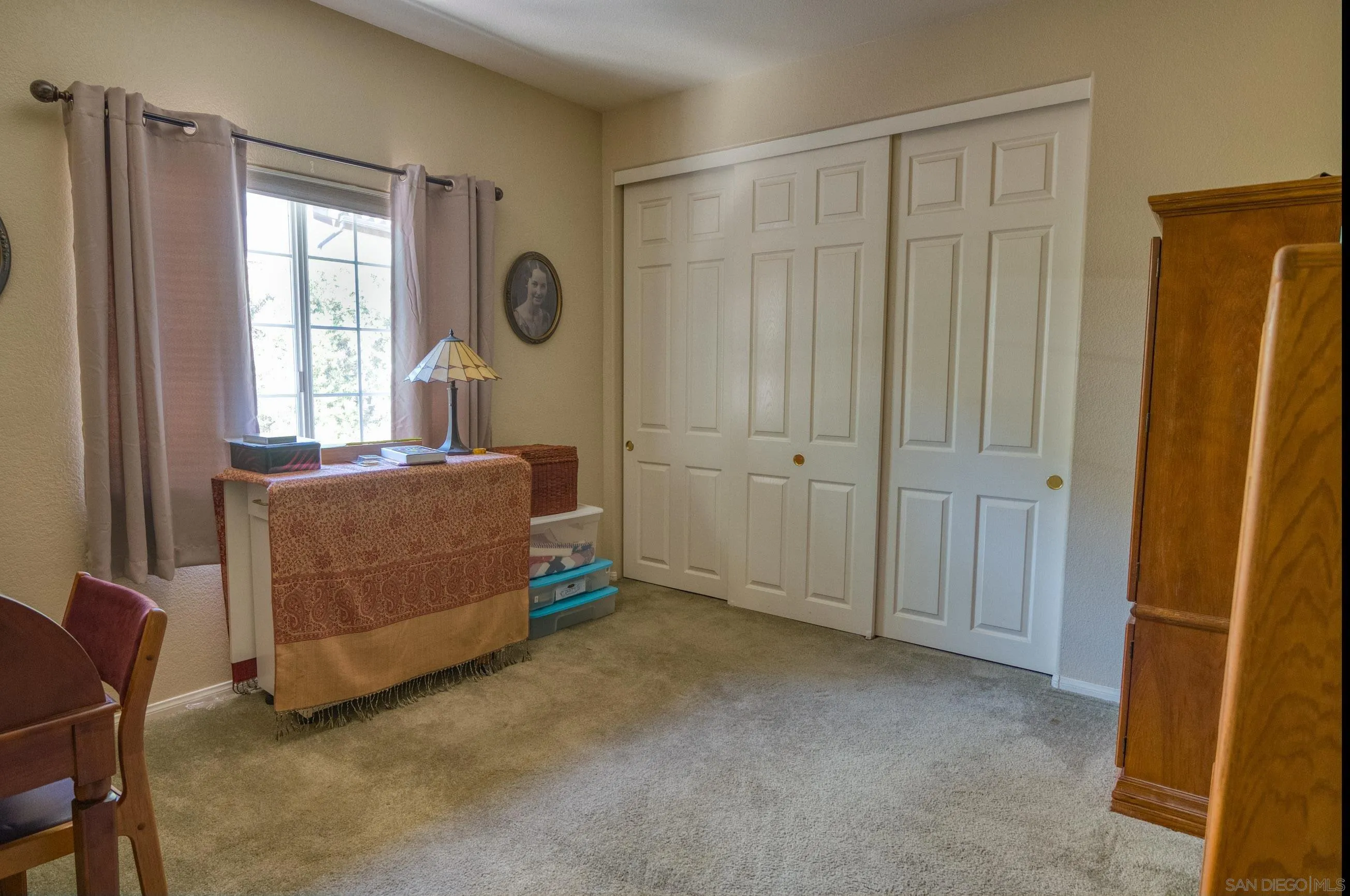 24517 Rutherford Road Ramona, CA 92065 - Photo 24 of 50 a living room with furniture and a window