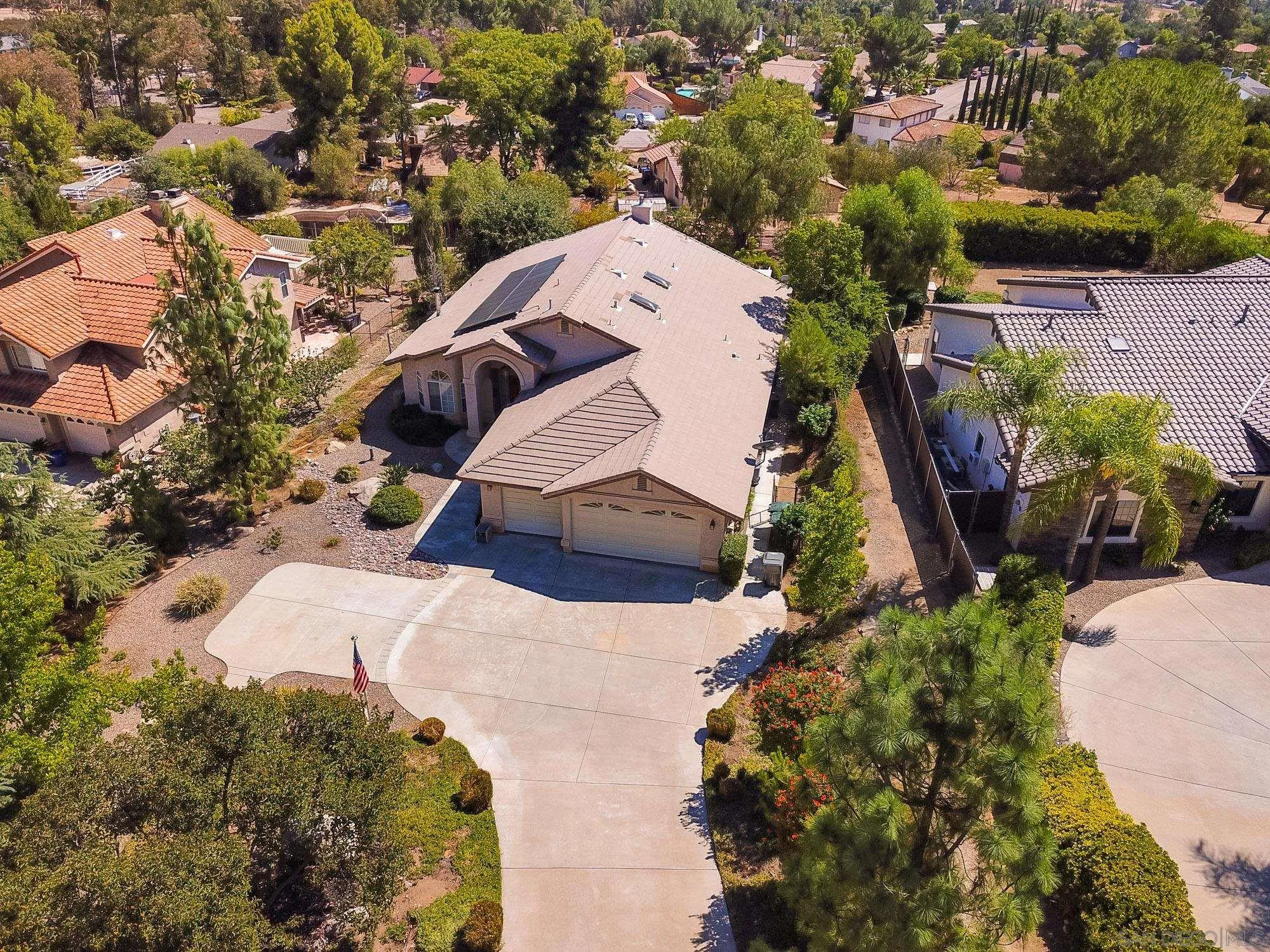 24517 Rutherford Road Ramona, CA 92065 - Photo 44 of 50 an aerial view of a house with a yard and garden