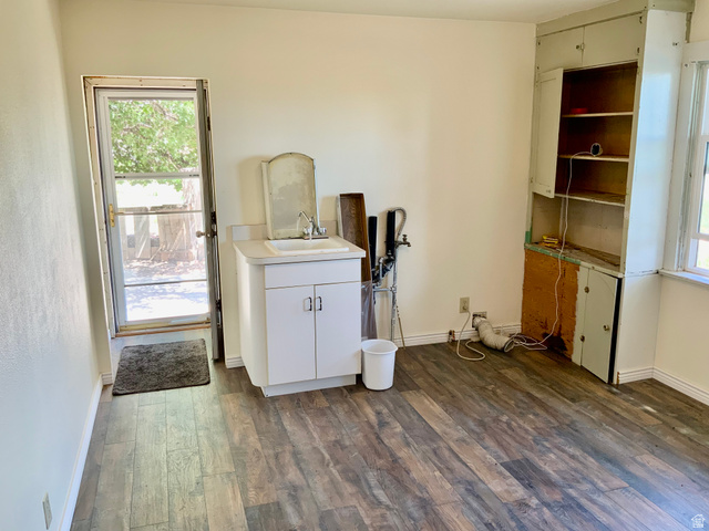 630 North Main Street Monroe, UT 84754 - Photo 7 of 63 Laundry room with plenty of natural light and dark wood-type flooring