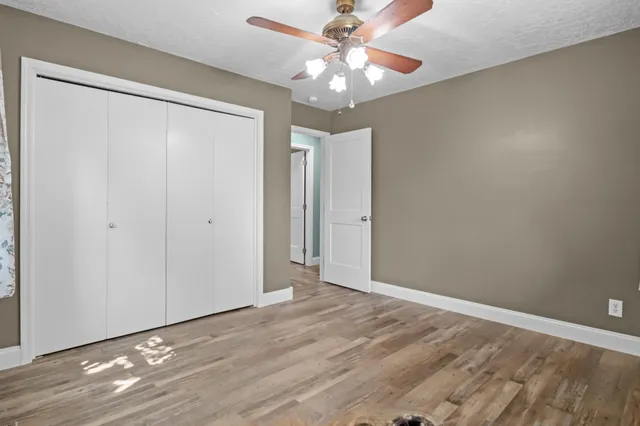 a bathroom with mirror a sink and a mirror