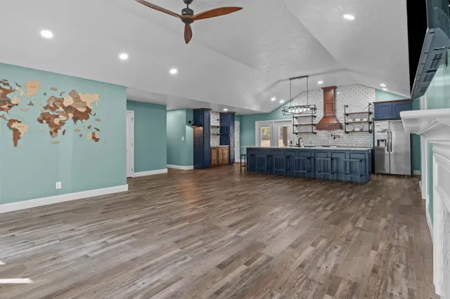 a view of kitchen and a wooden floor