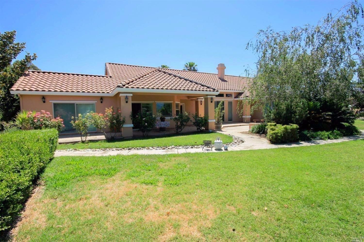 8283 Kobert Road Winters, CA 95694 - Photo 1 of 1 The views of the hills are outstanding! Custom built in 2003. Engineered septic system. All four bedrooms are adequately sized with large walk-in closets. Optional 5th bedroom or den. Surround sound system in the living room, master bedroom, bonus room and back patio area. Established peach, nectarine, cherry, blood orange, tangerine mandarin, apple, pear,lemon,and ruby red trees. Separate office area loaded with cabinets and plenty of work space. Garage is completely finished with room for all of life's extras. Covered lanai area, perfect spot to watch the sun go down...