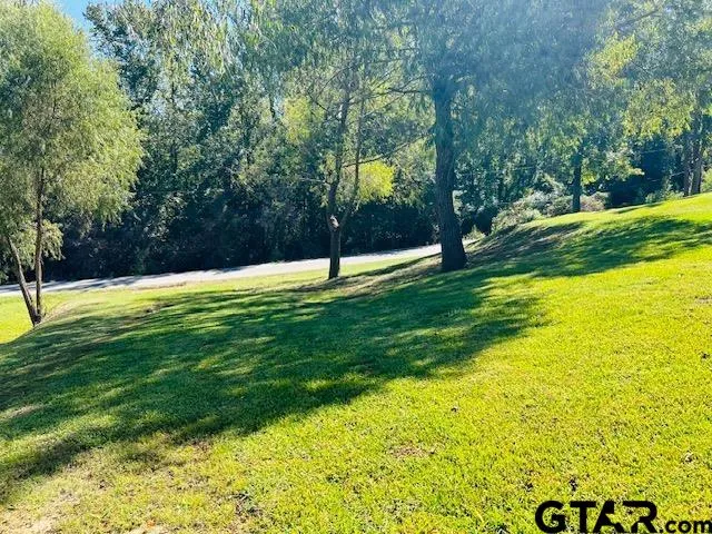 a swimming pool with wooden fence