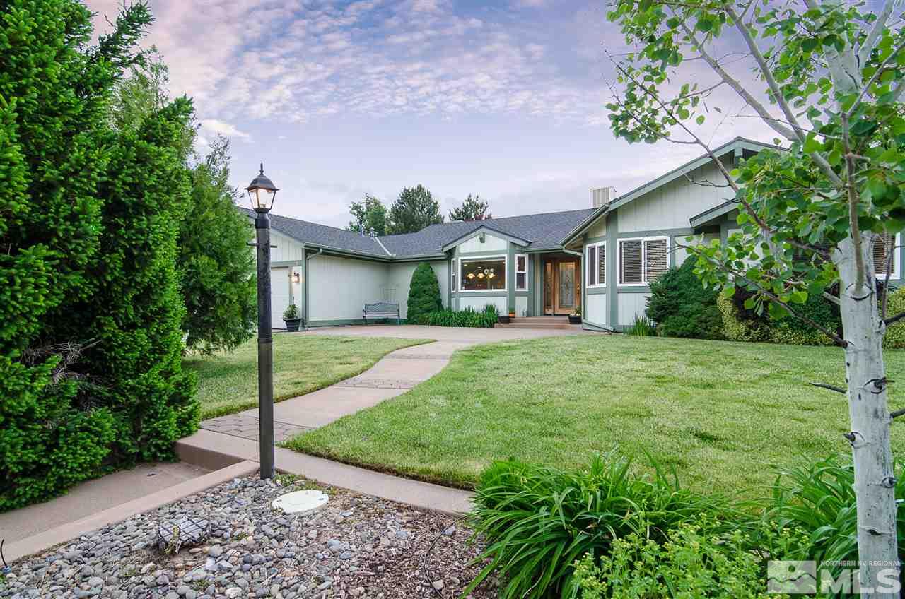 90 Lemming Drive Reno, NV 89523 - Photo 1 of 1 a front view of a house with garden