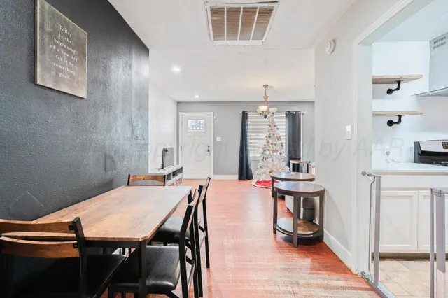 a view of a dining room with furniture