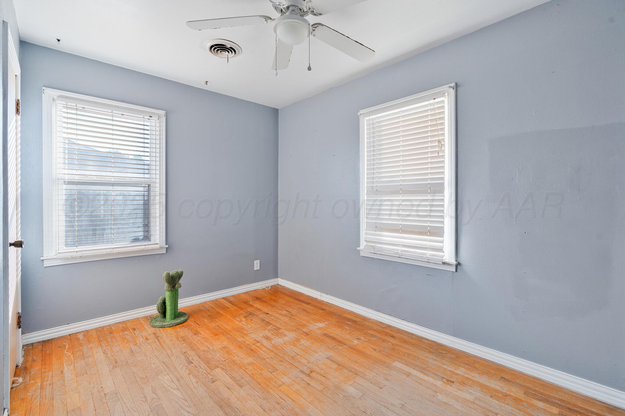 1814 Magnolia Street Amarillo, TX 79107 - Photo 17 of 26 a view of an empty room with a window