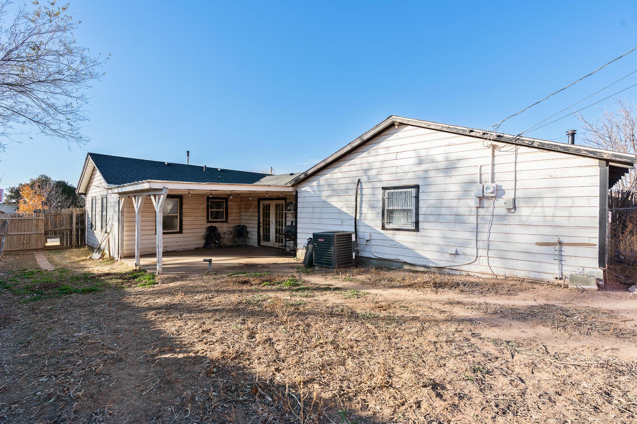 1814 Magnolia Street Amarillo, TX 79107 - Photo 24 of 26 a view of a house with backyard