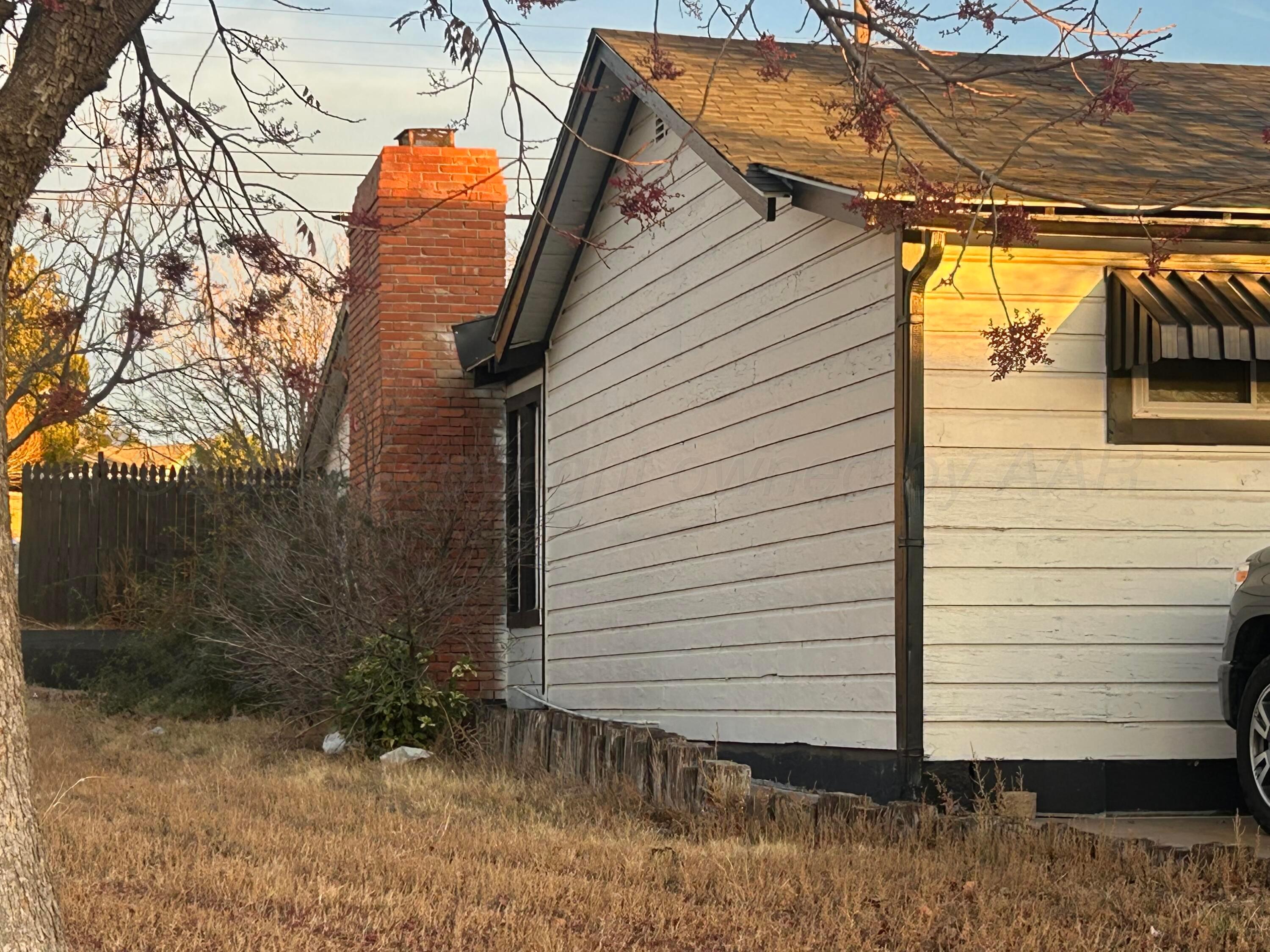 1814 Magnolia Street Amarillo, TX 79107 - Photo 6 of 26 a view of a house with a yard