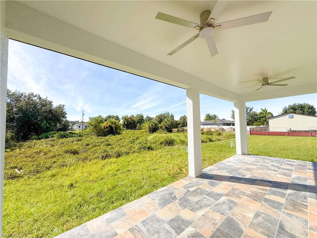 436 Rathburn Street Lehigh Acres, FL 33974 - Photo 18 of 22 View of patio / terrace featuring ceiling fan