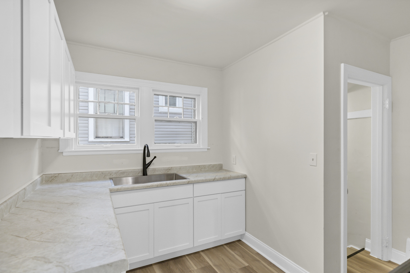 624 Lincoln Avenue Elgin, IL 60120 - Photo 9 of 24 a kitchen with sink and window
