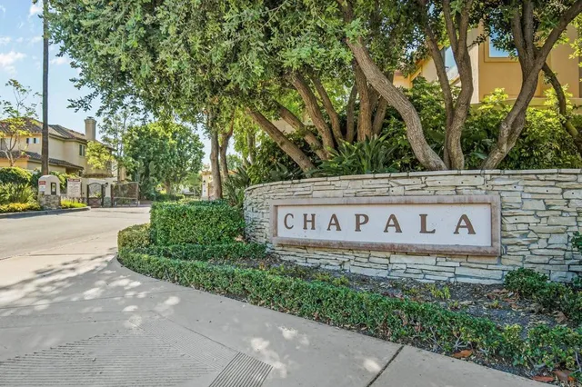 a sign on the side of a street