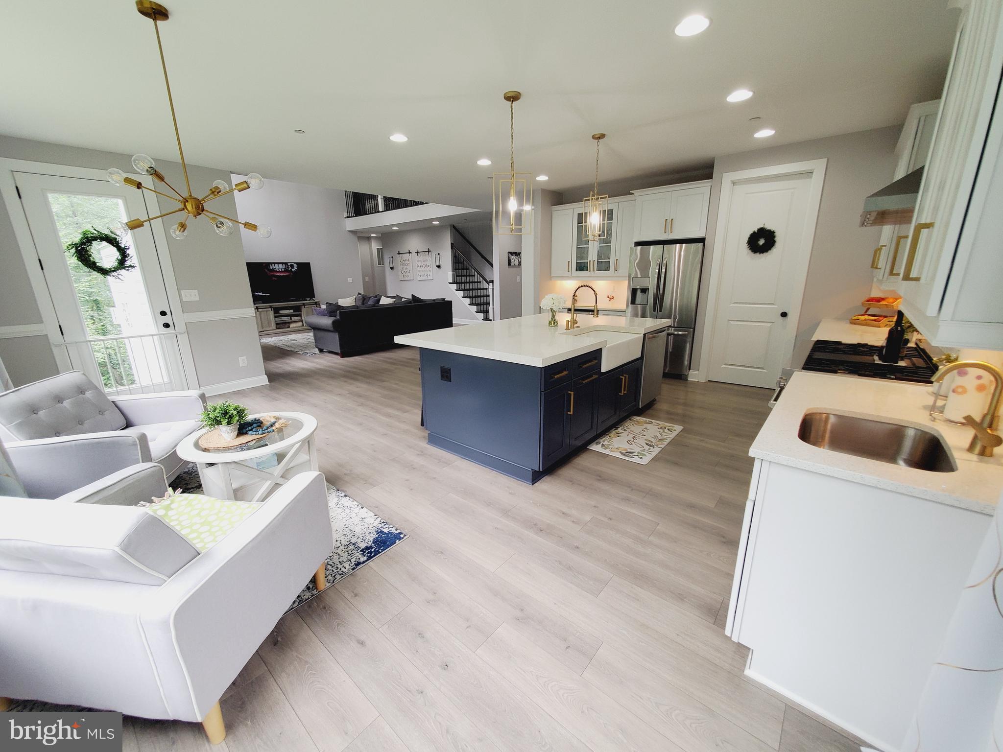 520 Walters Mill Road Forest Hill, MD 21050 - Photo 27 of 71 a living room with furniture and kitchen view