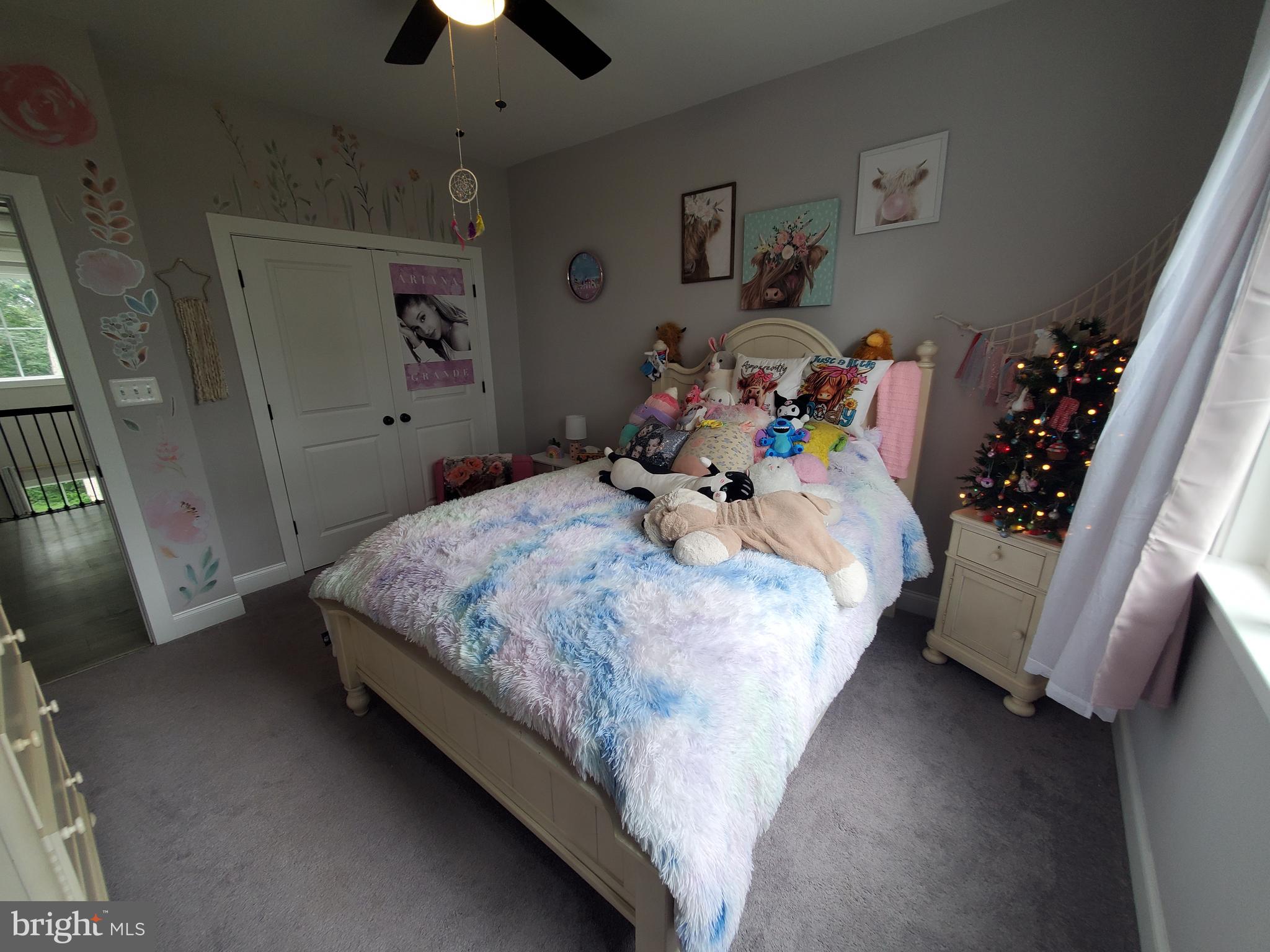520 Walters Mill Road Forest Hill, MD 21050 - Photo 46 of 71 a bedroom with a bed and a chandelier