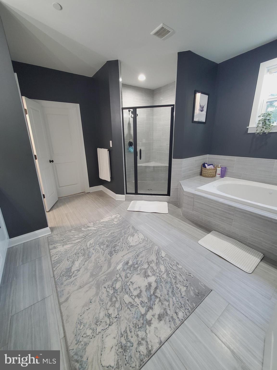 520 Walters Mill Road Forest Hill, MD 21050 - Photo 54 of 71 a spacious bathroom with a tub shower and sink