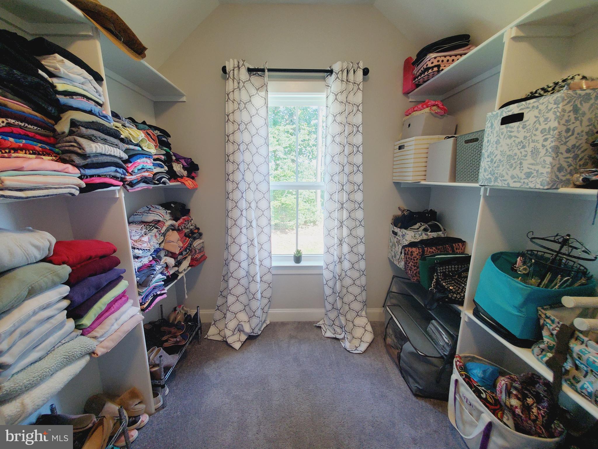 520 Walters Mill Road Forest Hill, MD 21050 - Photo 61 of 71 a view of walk in closet with clothes and shoes