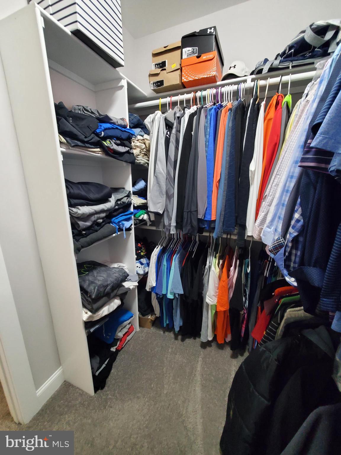 520 Walters Mill Road Forest Hill, MD 21050 - Photo 63 of 71 a view of walk in closet with clothes and shoes