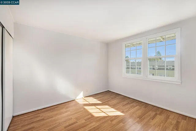 a bathroom with a toilet sink and shower