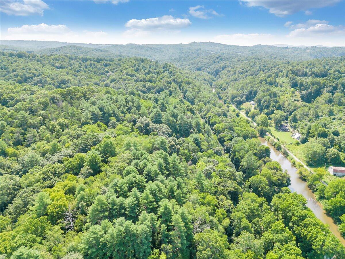 0 Sowers Mill Dam Drive Northeast Riner, VA 24149 - Photo 11 of 25 an aerial view of residential houses with outdoor space and trees