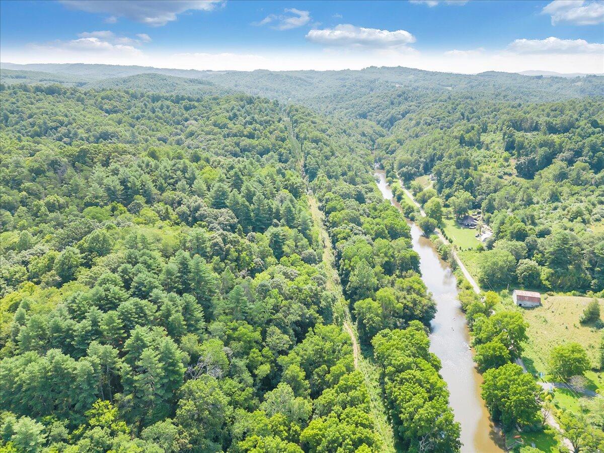 0 Sowers Mill Dam Drive Northeast Riner, VA 24149 - Photo 19 of 25 an aerial view of residential houses with outdoor and green space