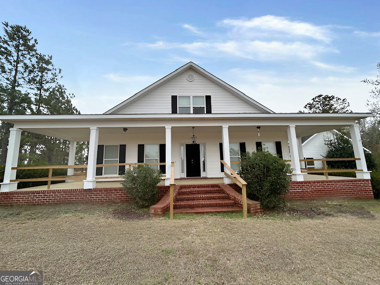 188 John Jarriel Road Collins, GA 30421 - Photo 1 of 1 a front view of a house with garden