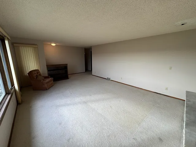 a view of a livingroom with furniture