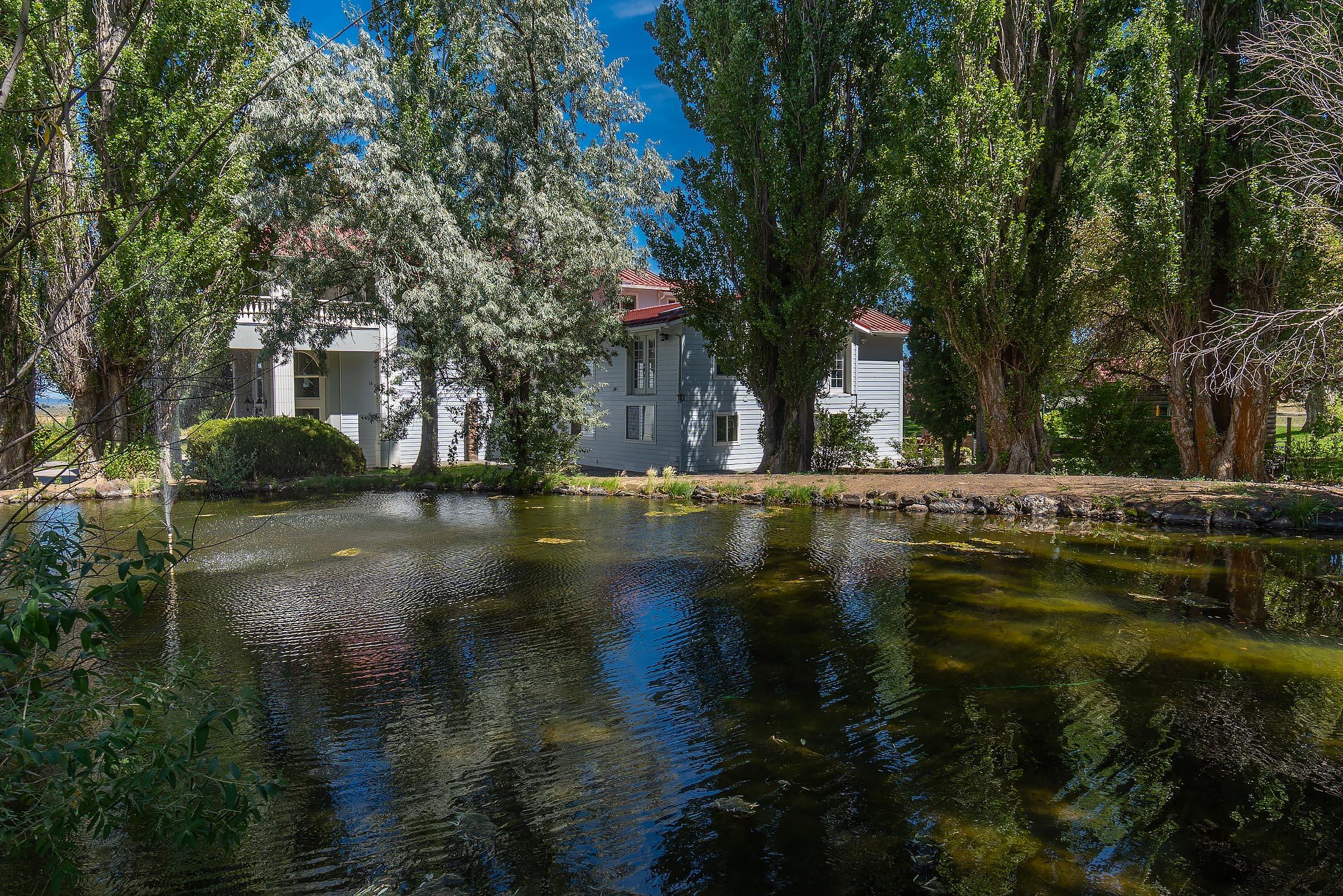 59047 Old Lake Road Christmas Valley, OR 97641 - Photo 3 of 55 View of the home looking across the pond
