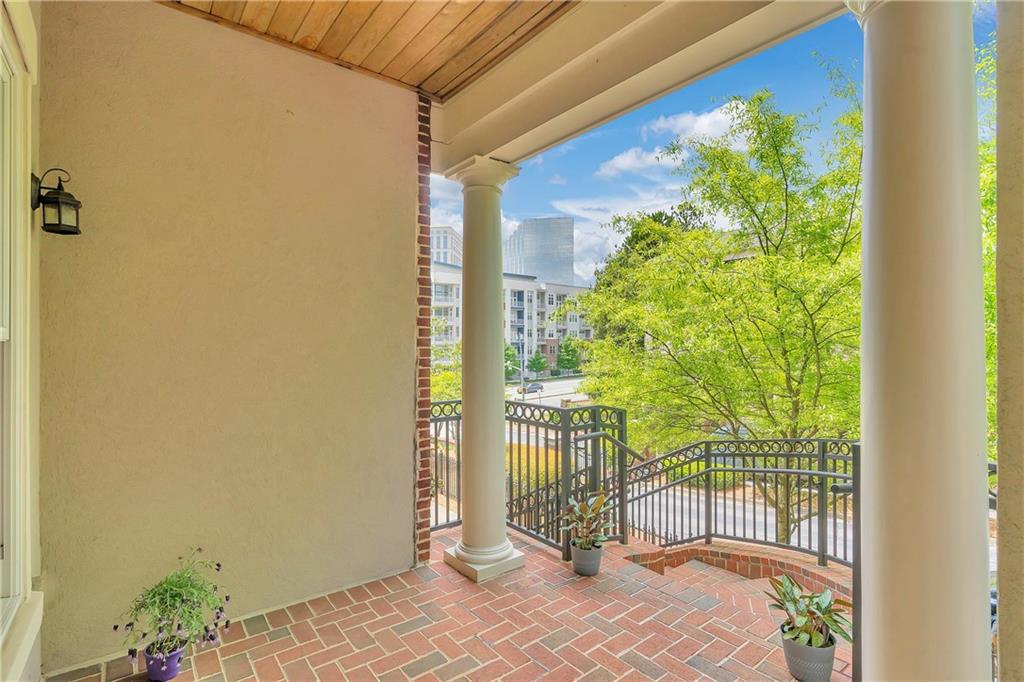 3635 East Paces Circle, Unit 1109 Atlanta, GA 30326 - Photo 5 of 22 a view of a garden from a room
