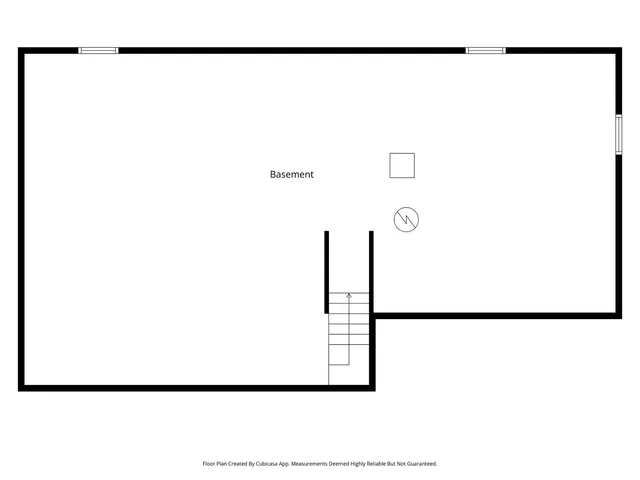 a front view of a building with a yard