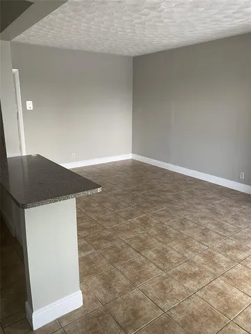 a view of lot of kitchen and a sink