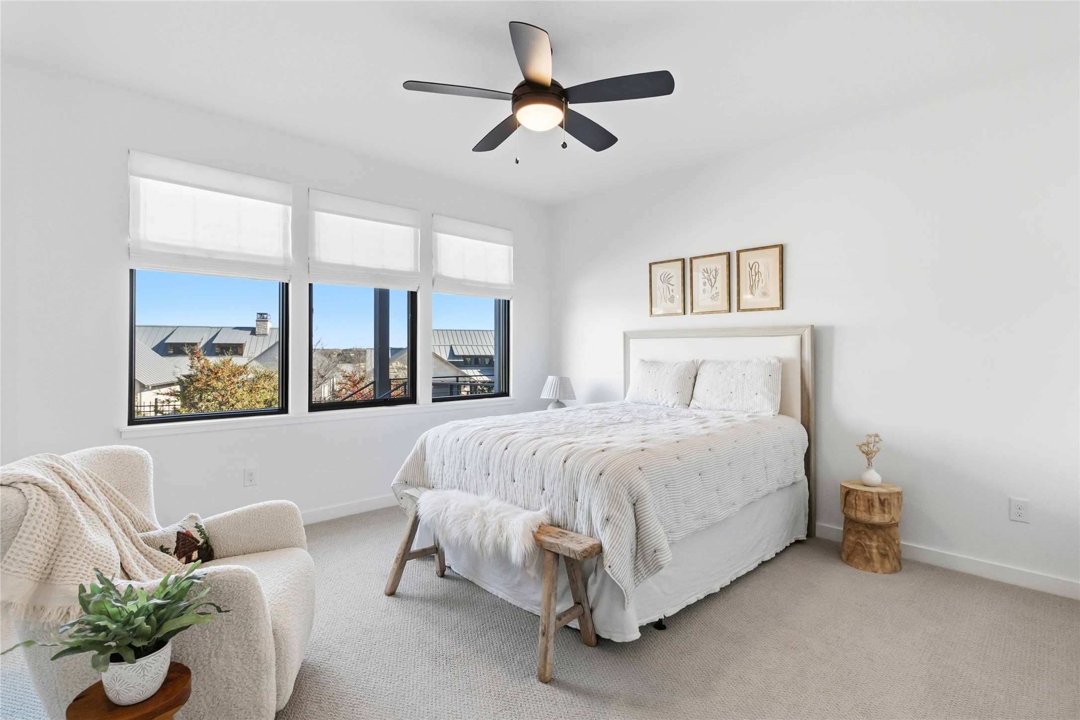 410 Kayak Way Austin, TX 78738 - Photo 25 of 40 a spacious bedroom with a bed couch and window