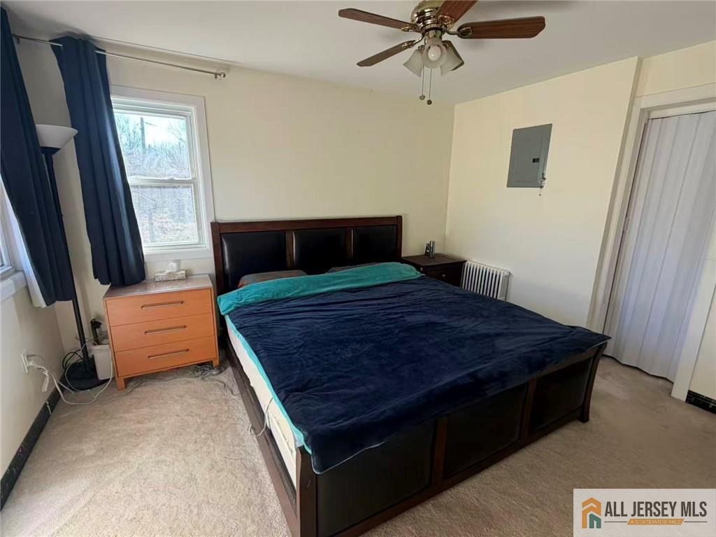 57 North Disbrow Hill Road Monroe Township, NJ 08831 - Photo 15 of 24 a bedroom with a bed and a window